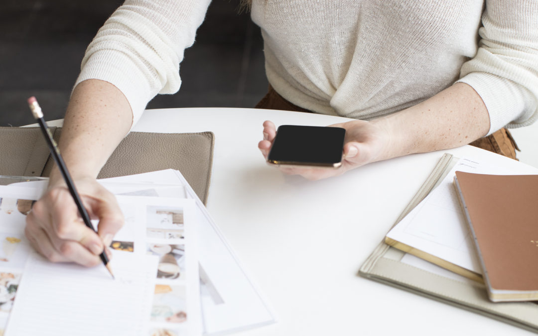 female working at her desk on her social media